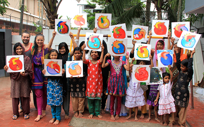 Girls painting their hearts at Crescent Girls Orphanage during the Hearts of the World workshop in Kochi, Kerala