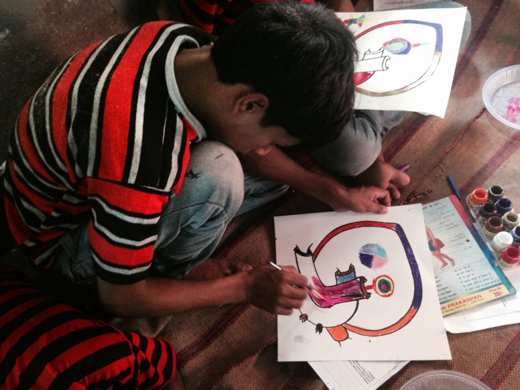 Children rescued from child labor painting their hearts at Mukti Ashram Delhi during a Hearts of the World workshop