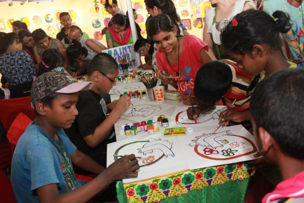 Hearts of the World open painting table exhibition in Tompkins Square Park, East Village New York City